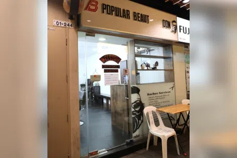 被告哈菲兹案发时在这家理发店当理发师。（庄耿闻摄）
