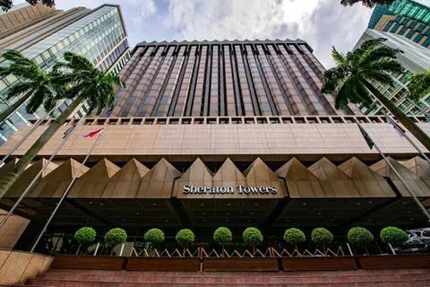 被告高娟赵冒充万豪旅享家会员家属以享有订房折扣，在一个月内入住新加坡喜来登酒店14天。（档案照片）