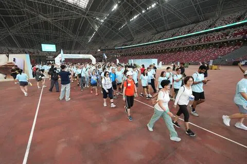 健步走活动9月13日在加冷汇举行。配合新加坡建国61周年，路线全程约五公里，约等于6100步。（三星电子新加坡提供）