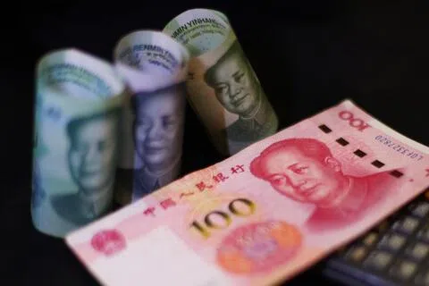 人民币是今年亚洲兑美元表现最好的货币，有望实现连续第七个季度上涨。（档案照）