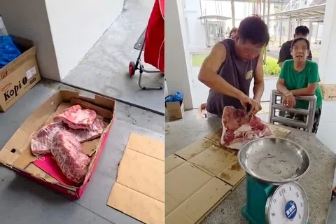 盛港一座组屋楼下疑似连续三个周六出现流动猪肉摊贩。（受访者提供）