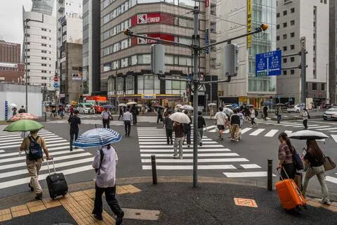 名古屋过去几天面对连绵雨势，下星期一又可能遭遇恶劣气候。（法新社）
