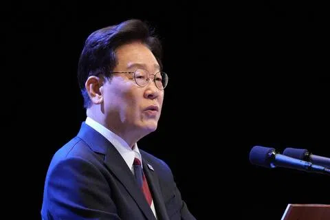 韩国最新民调显示，总统李在明的施政好评率再创新低。图片摄于8月15日。（法新社档案照片）