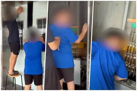 网上流传的一段视频显示，两名男生趁电梯维修之际，打开电梯门，进入电梯井，在电梯上站立数秒才离开。（慈母舰视频截图）