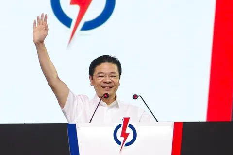 人民行动党星期天（10月25日）举行两年一度的干部大会。黄循财总理以秘书长身份致辞时强调，政府不仅要推动经济增长，也要确保增长成果能落实为新加坡人更美好的生活。他指出，政府须有勇气作出艰难决定，但也须贴近国人倾听民意，随时准备在施政未达到预期时作出改变。（林明顺摄）