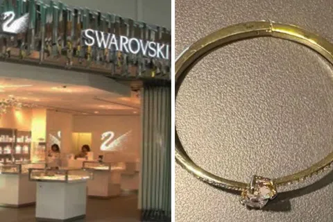 中国籍女子在樟宜机场第三搭客大厦离境过境区的施华洛世奇（Swarovski）专卖店涉嫌偷窃。（取自网络／新加坡警察部队提供）