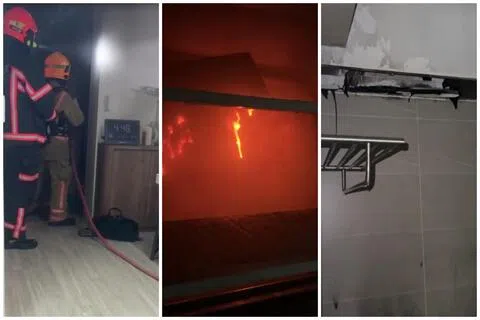 民防部队到场后用消防水管将浴室LED灯箱的火扑灭，灯箱及部分塑料部件被烧至熔化。（受访者提供）