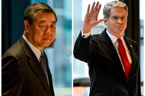 中国国务院副总理何立峰（左）和美国财政部长贝森特星期天（9月20日）在位于美国纽约的摩根大通全球总部举行会谈。（路透社）