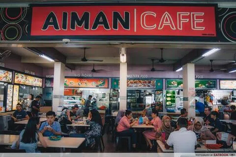 被告偷走裕廊东21街Aiman Café咖啡店摊位外的两个捐款桶。（取自脸书）