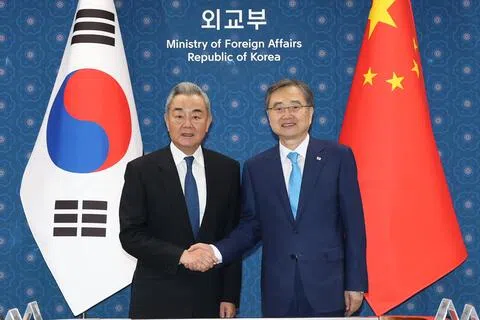 王毅：乐见韩朝和平共处 促美改变对朝敌视政策