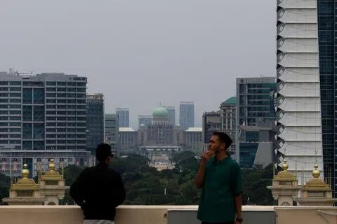 马国烟霾情况星期二（9月22日）略有好转，中马布城当天下午的空污指数降至86点中等水平。（马新社）