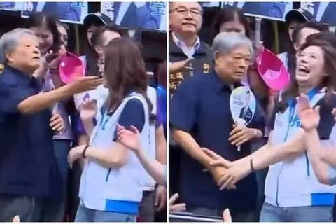 前新竹县长范振宗星期四现身国民党新竹县参选登记活动时，一度作势掌掴国民党主席郑丽文，郑丽文随即抬手挡开。（自由时报）
