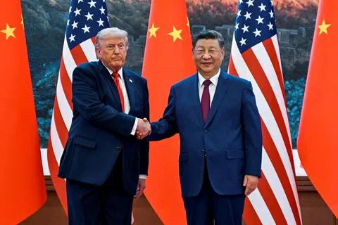 中国国家主席习近平（右）将于9月23日至25日对美国进行国事访问，与美国总统特朗普（左）举行年内第二次面对面会谈。此次访问聚焦于贸易、地区安全以及加强全球两大经济体之间的双边关系。图为特朗普5月访华时在北京人民大会堂与习近平会面。（路透社档案照）