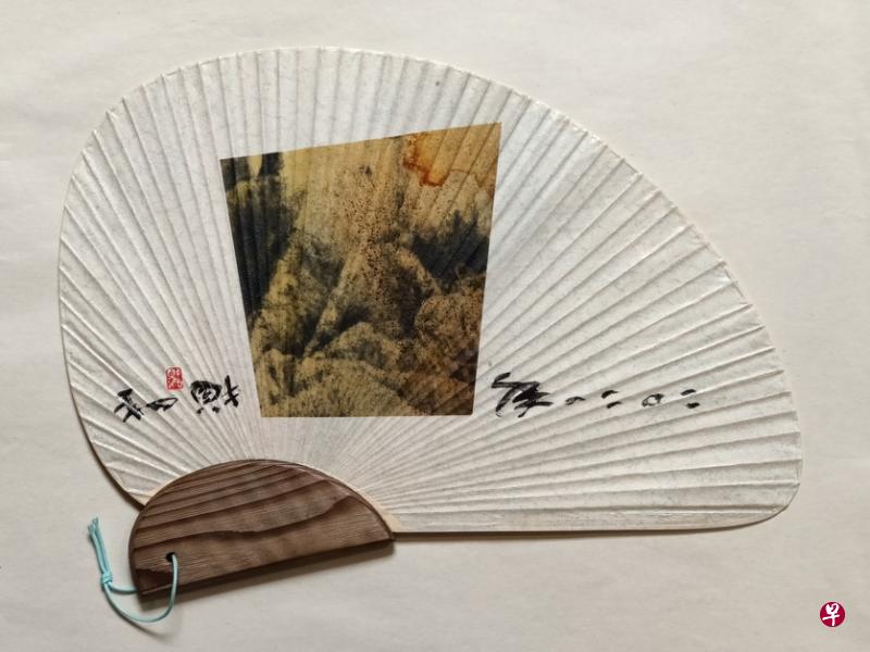 胡财和的山水成扇作品。（主办方提供）