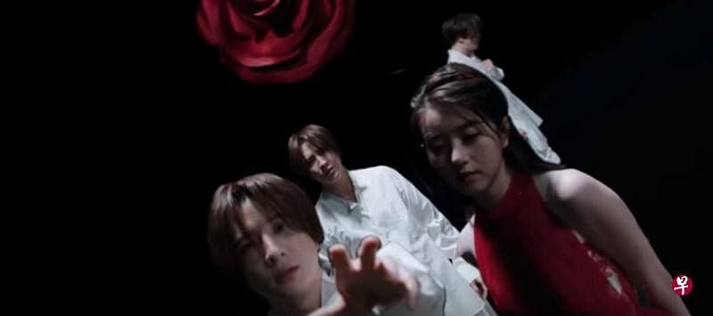 李凯馨出任薛之谦歌曲MV女主角，周旋在电脑效果制造的多个薛之谦之间。（视频截图）