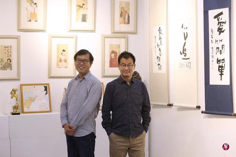 南治国（右）、赵宏第一次联办画展“云淡风轻”，通过笔墨线条，展示自我与性情。