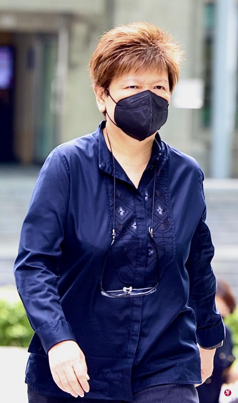 凯发集团前总裁林爱莲面对三项抵触证券与期货法令以及公司法的罪状，被控后离开国家法院。（陈来福摄）
