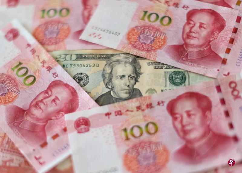 中国要实现人民币国际化，还有一段很长的路要走。为实现这个目标，中国必须提高人民币资产的流动性，简化外国投资者进入中国市场的流程。（中通社）