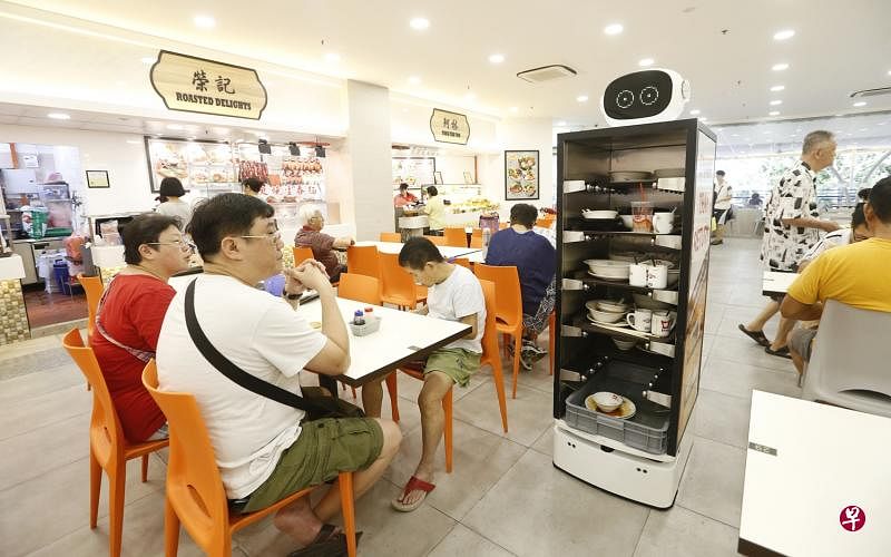 集团将在熟食中心设有“Smart Tray Return”收碗碟机器人。（档案照）