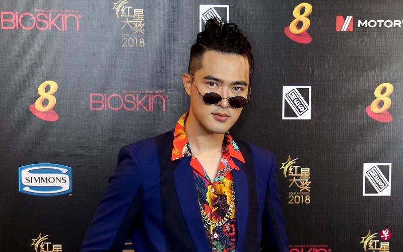 李腾说，张振寰与这个美女顾客会走在一起，让他颇意外。（档案照）