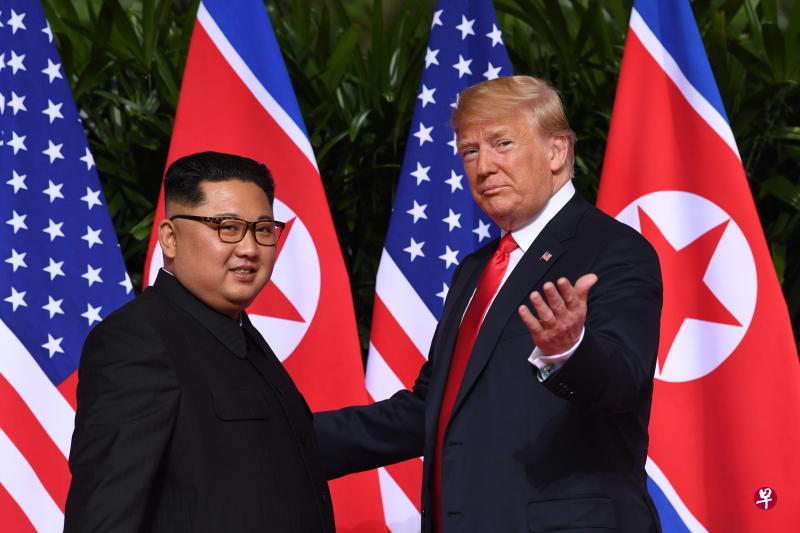 美国总统特朗普和朝鲜最高领导人金正恩，今天在新加坡圣淘沙嘉佩乐酒店举行历史性会晤。（法新社）