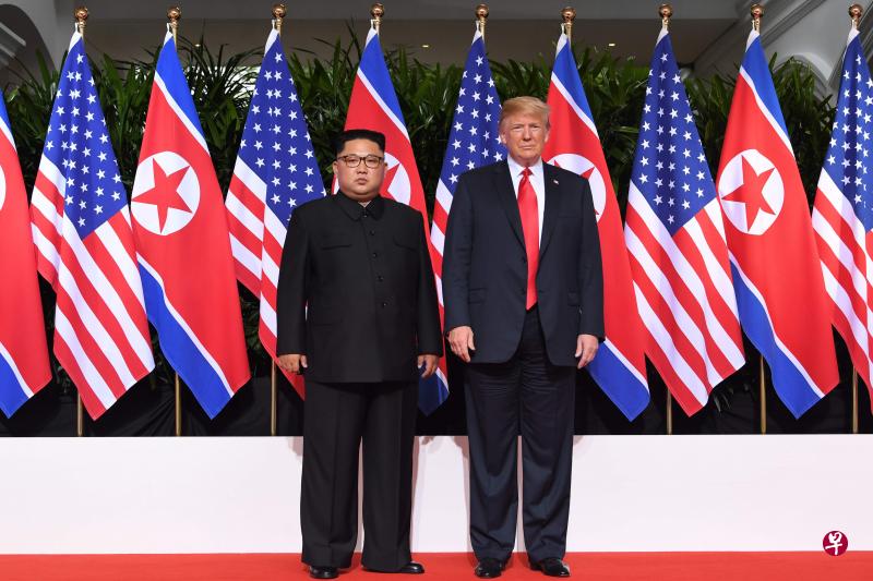 美国总统特朗普和朝鲜最高领导人金正恩，今天在新加坡圣淘沙嘉佩乐酒店举行历史性会晤。（法新社）