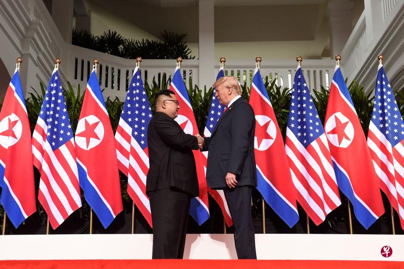 美国总统特朗普和朝鲜最高领导人金正恩，今天在新加坡圣淘沙嘉佩乐酒店举行历史性会晤。（法新社）