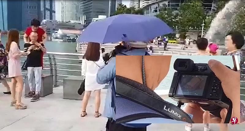男子被拍，拍完照后查看画面。（读者提供）