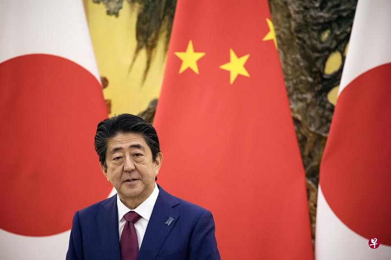 日本首相安倍晋三访华。（彭博社）
