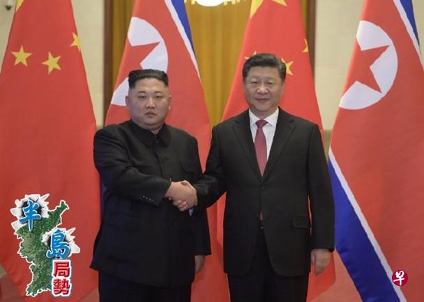 会谈前，习近平（右）在人民大会堂北大厅为金正恩举行欢迎仪式。（互联网）