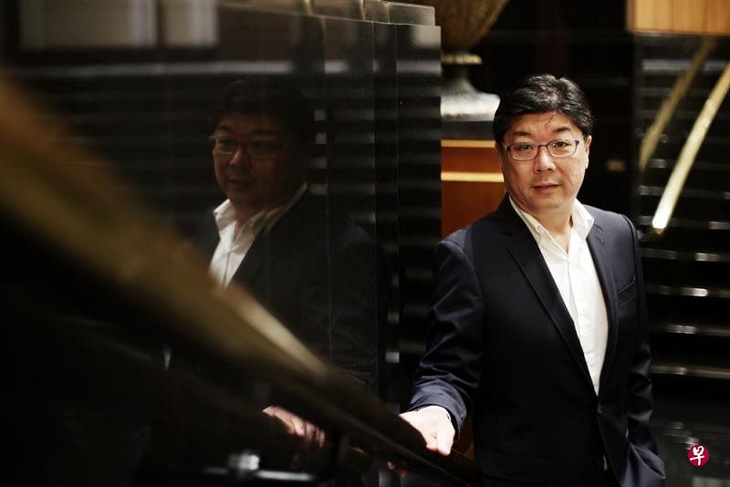 林振聪：工厂式养殖成功压低了虾价，使人人都吃得起鲜虾。（陈渊庄摄）