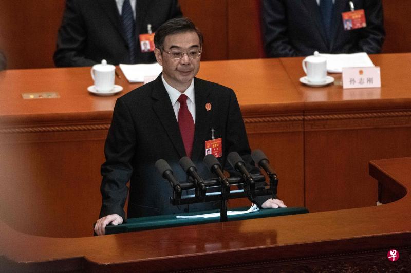 中国最高人民法院院长周强昨天向全国人大做报告。（法新社）