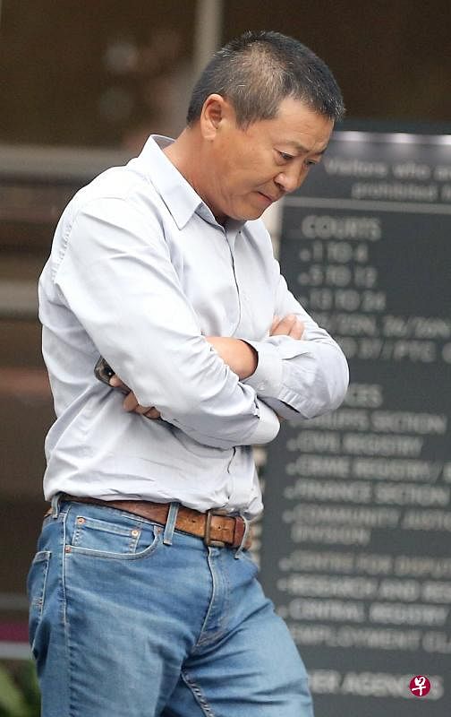 55岁的陈明昨天被判罚款6万元。（海峡时报）
