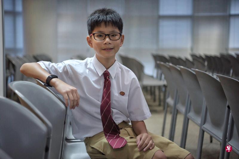 就读于维多利亚学校的陈君恺（12岁）是其中一名得奖者，获颁500元现金。（海峡时报）