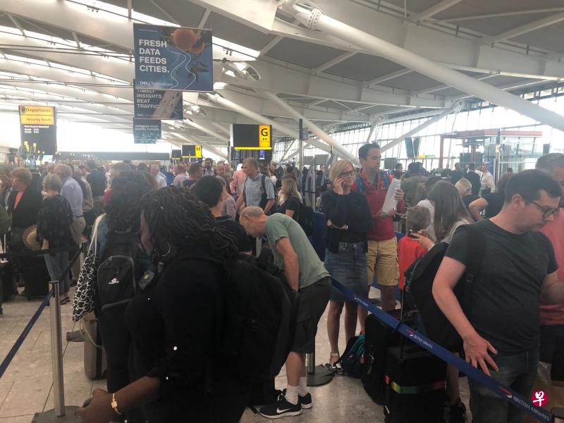 英国航空公司（British Airways）因信息技术系统出现故障，数百次航班被取消或延误，多名乘客因无法登机滞留在机场。（路透社） 