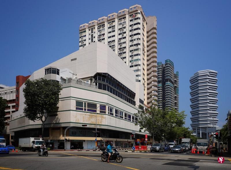 布业中心大厦的部分商、住单位业主有意再次集体出售大厦。（林泽锐摄）