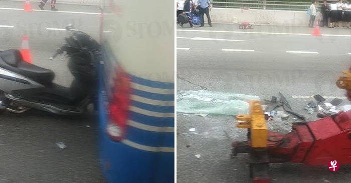 武吉知马高速公路发生车祸，摩托车撞上巴士后方，巴士前方地上散落不少碎片。（Stomp网站截图）