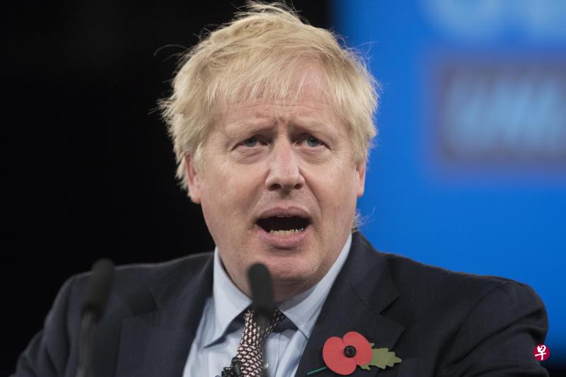 约翰逊敦促英国选民协助他领导的保守党赢得国会多数议席，称只要赢得多数议席，他就能让国会恢复运转。（彭博社）