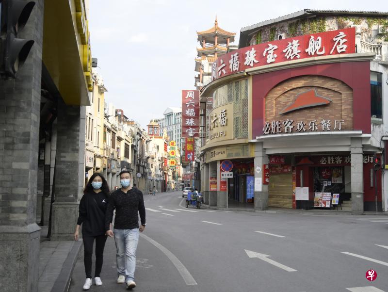 广东省广州市上下九路受冠病疫情影响，行人寥寥。（中新社）