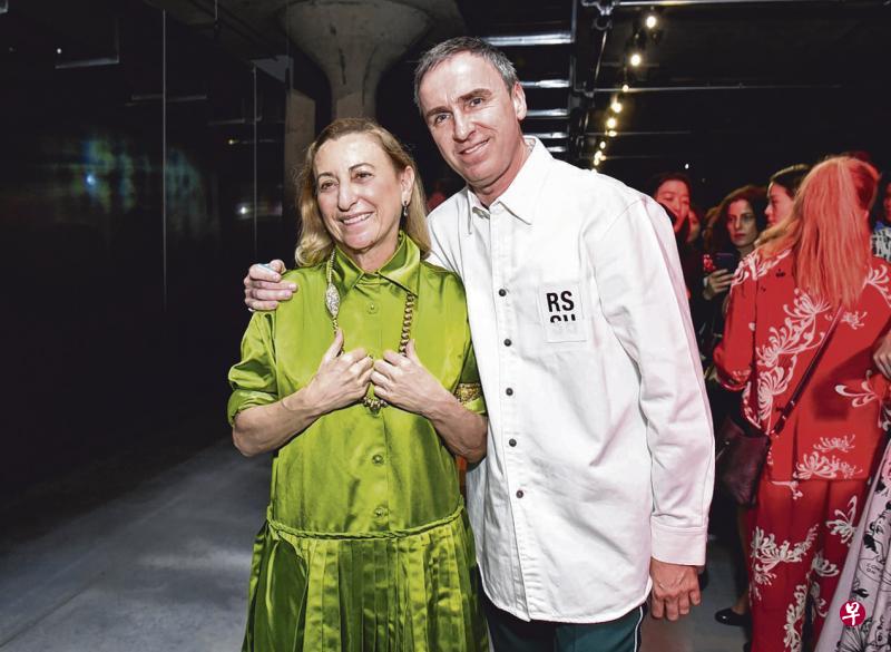 Raf Simons（右）与Miuccia Prada将共同担起品牌创意大权。（互联网）