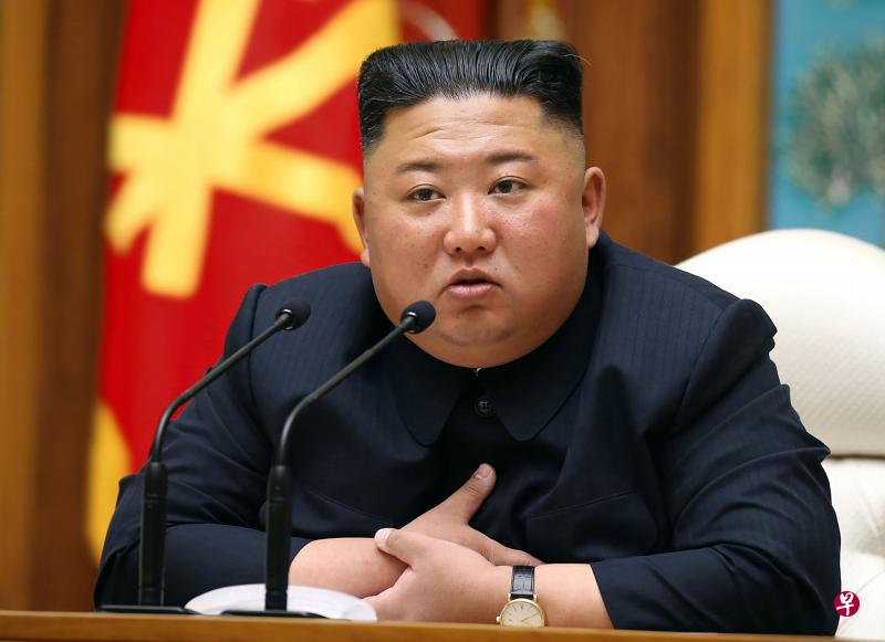 4月11日，朝鲜领导人金正恩在平壤举行的劳动党中央委员会政治局会议上讲话。（法新社） 