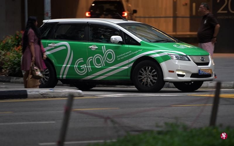 Grab规定从本月底起，乘客在叫车前得先在应用申报健康情况，上车后也不能坐在副驾驶座。（档案照）