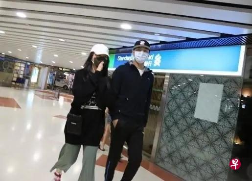 马国明（右）与汤洛雯拍拖被媒体拍到。（互联网）