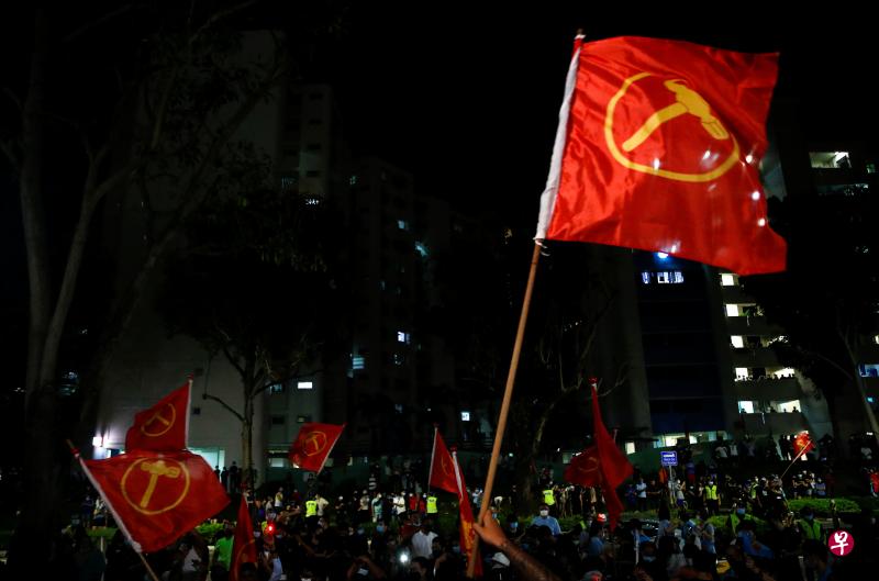 工人党成功地保住后港和阿裕尼集选区的议席，并在一场著名的胜仗中，拿下了新的盛港集选区。（路透社）