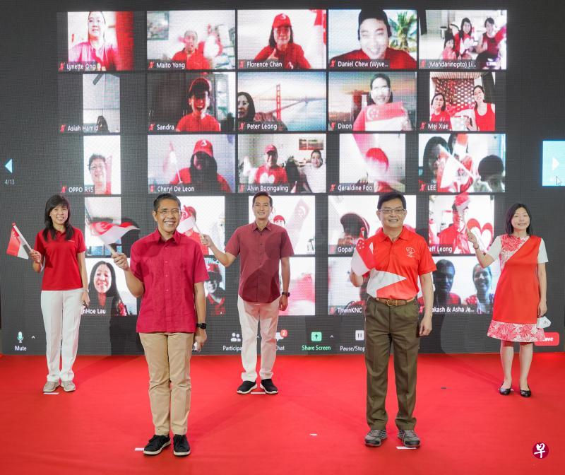 住在勿洛的约300户家庭昨早通过视讯，与副总理兼经济政策统筹部长及财政部长王瑞杰（右二）及另外四名东海岸集选区议员陈舜娘（左起）、总理公署部长兼教育部和外交部第二部长孟理齐博士、总理公署兼国家发展部政务部长陈杰豪，以及陈慧玲，参与首个线上国庆敬礼仪式。（人民协会提供）