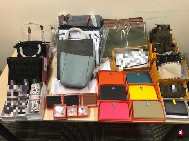 在全岛多处同步扫荡，警方上月的行动中起获超过690件侵犯商标的服饰和用品，商品市值估计超过2万4000元。（新加坡警察部队提供）