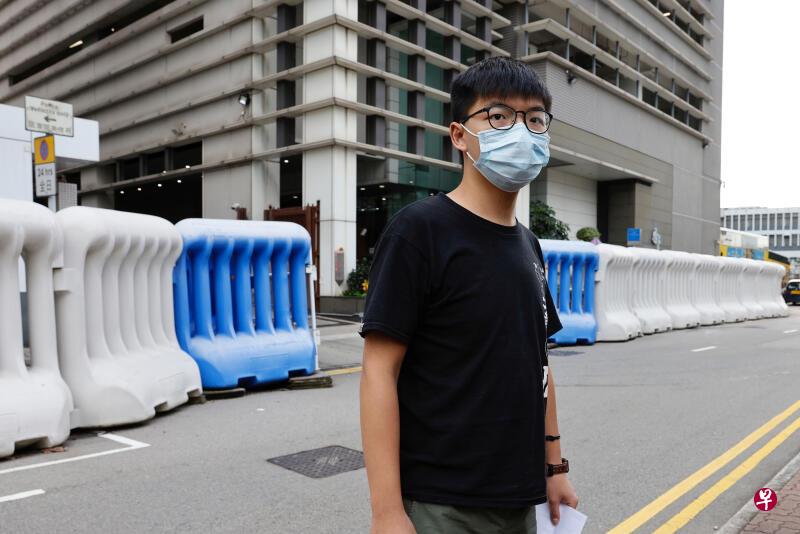 黄之锋谈到去年6月涉嫌包围警总案件时说，他与周庭和林朗彦决定承认所有控状，并不排除今天即时被判入狱。（路透社）