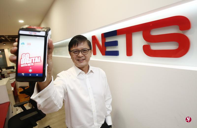 NETS集团首席执行官陈明耀认为，疫情给数码付款领域带来正面改变，人们对无现金模式的接纳度比以往更高。（陈渊庄摄）