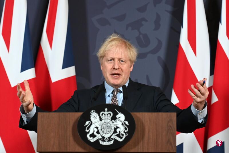 英国首相约翰逊在伦敦唐宁街举行记者会。（法新社档案照片）