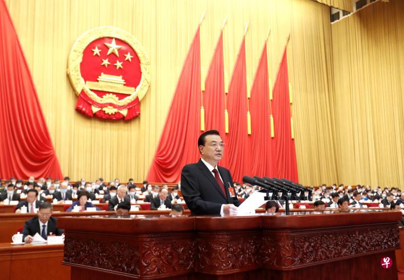 中国总理李克强在今年的政府工作报告中重提“九二共识”，但未提“和平统一”，引发舆论猜测北京未来是否更有可能通过非和平手段解决台湾问题。（中新社）